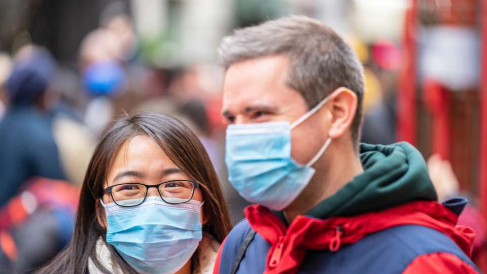 People wearing a face masks to protecting themself